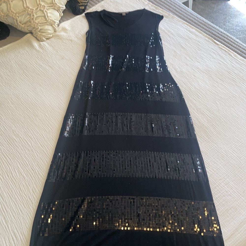 Tommy Bahamas size M/M. Long black dress with cap sleeves and sequins stripes.